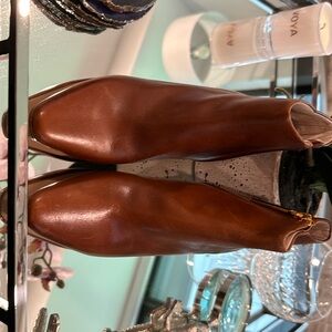 Caramel color heeled booties by Louise Ellen Cie